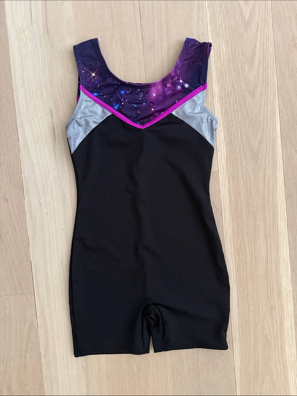 More Than Magic Black One-Piece with Purple Galaxy Yoke and Pink Trim